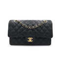 Chanel Classic Flap medium in black caviar leather with gold hardware