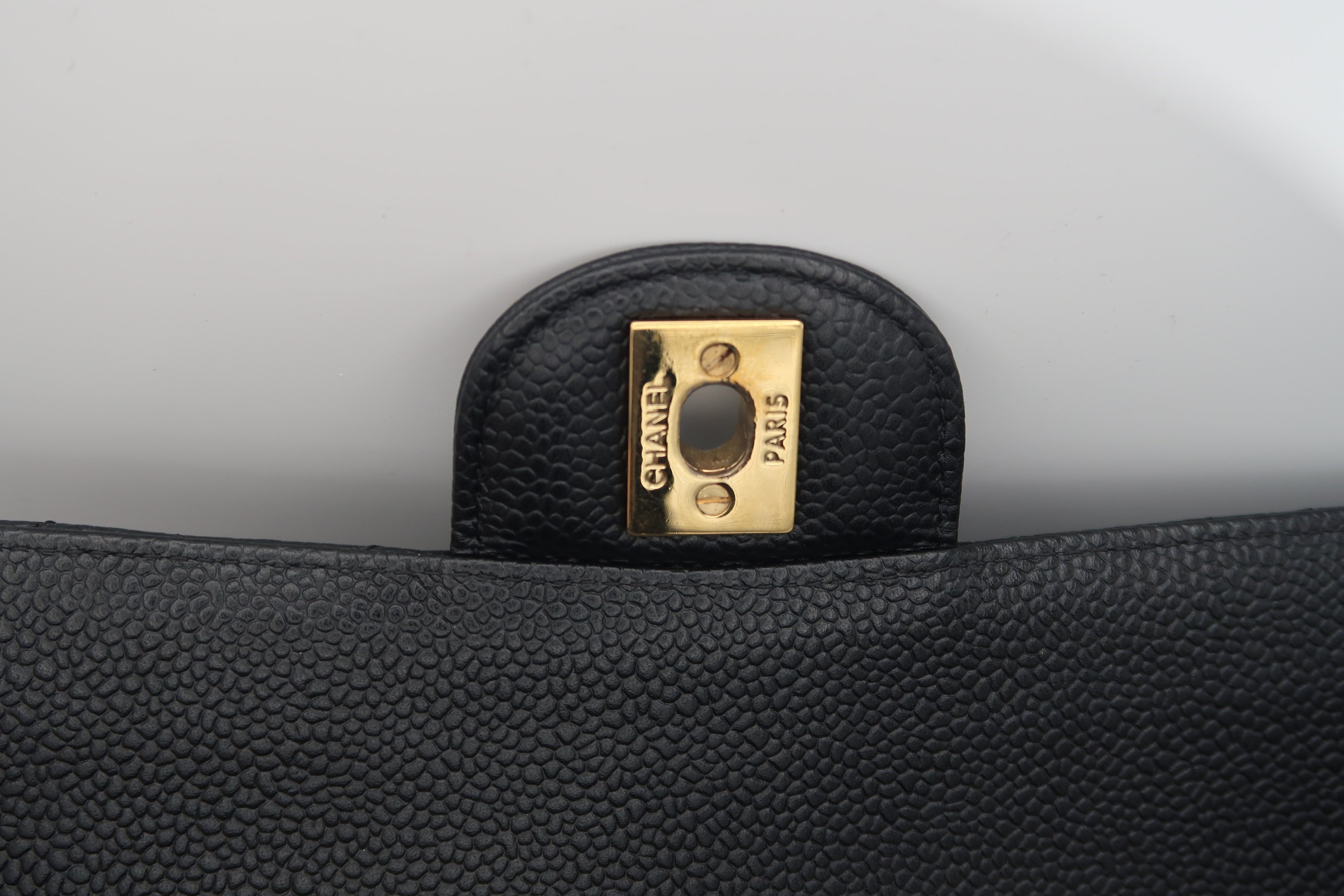 hardware on Chanel Classic Flap in black caviar