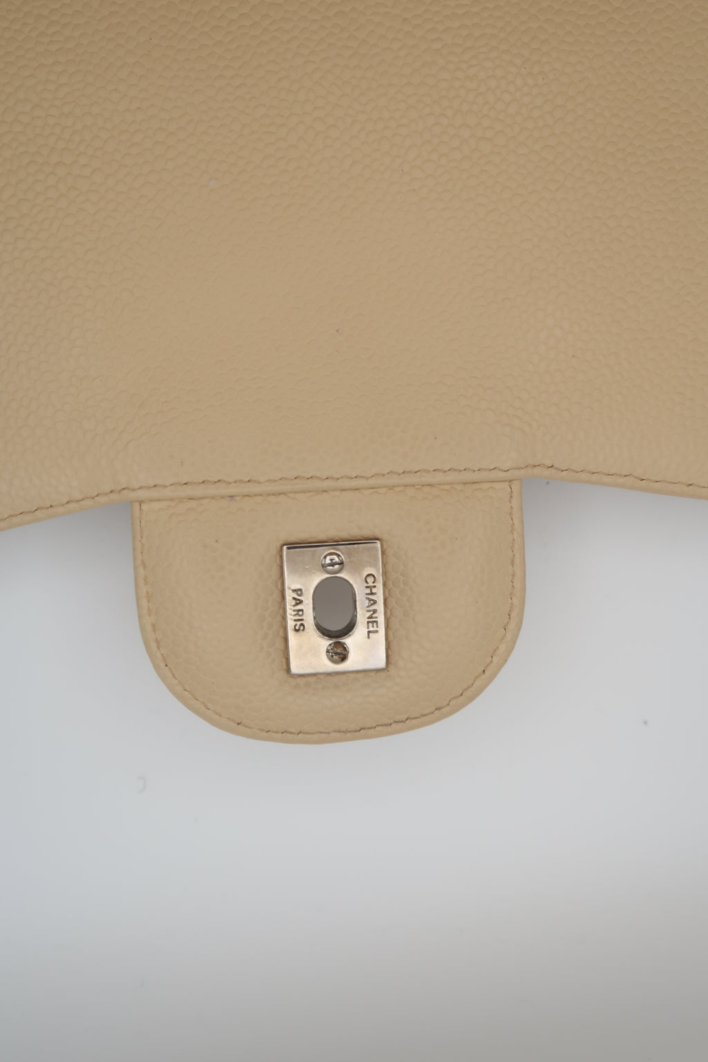 hardware on Chanel Classic Jumbo in beige caviar